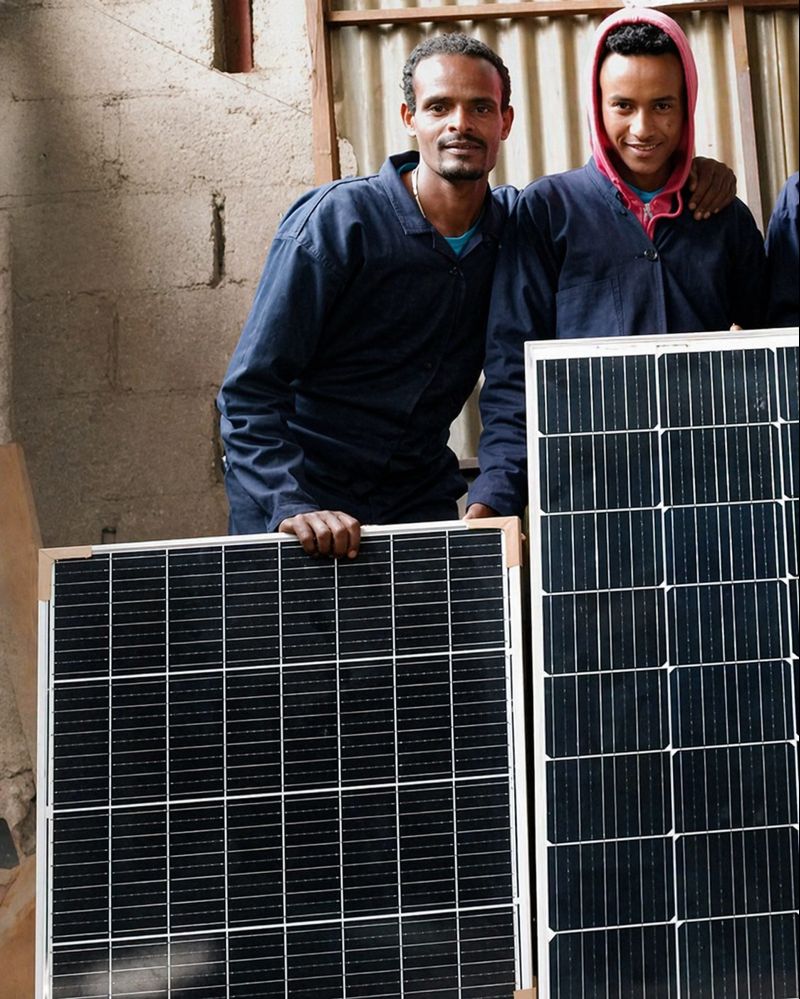 Solar-powered irrigation pump installation team